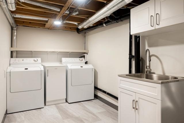 a laundry room with washers and dryers