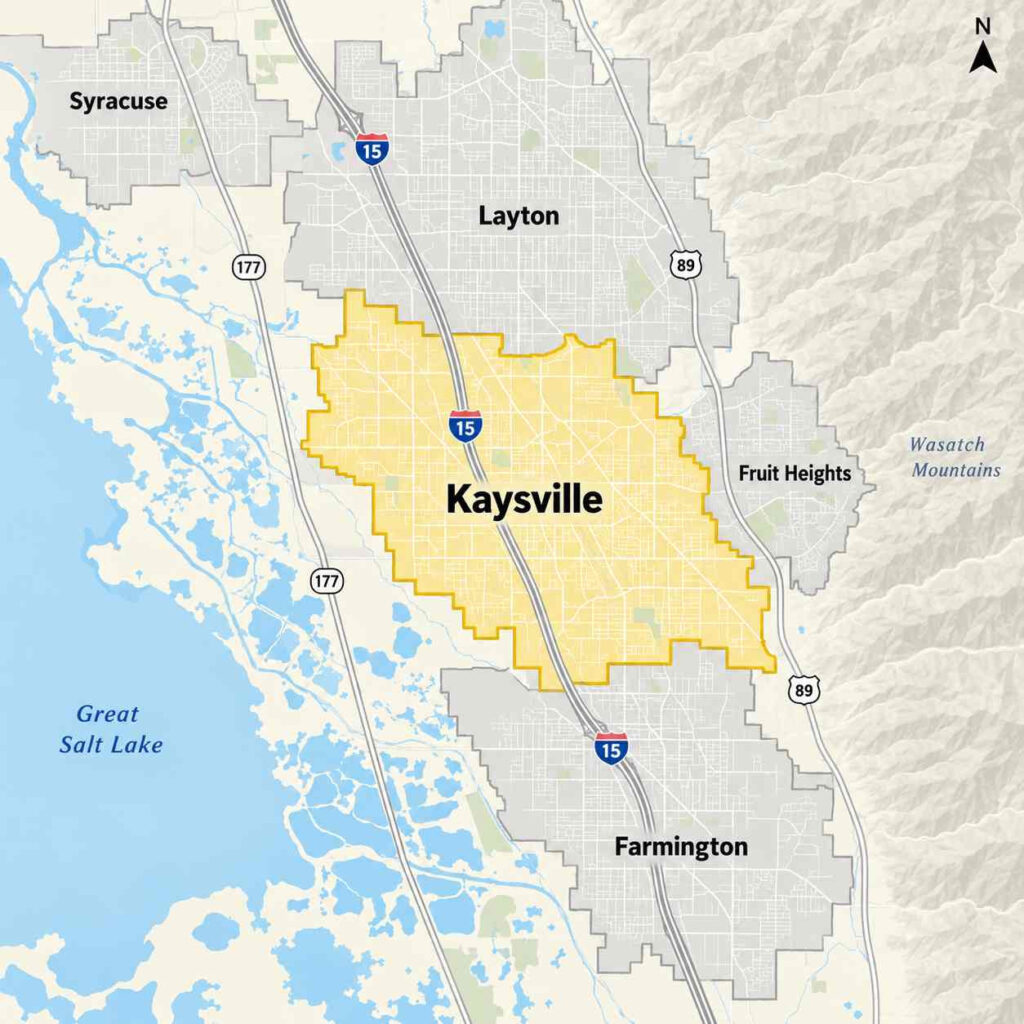 Map showing beeline pest control’s service area in kaysville, utah, with a red dashed boundary around kaysville and nearby layton, fruit heights, and farmington, including barnes park, heritage park, and davis technical college along us-89 and i-15.